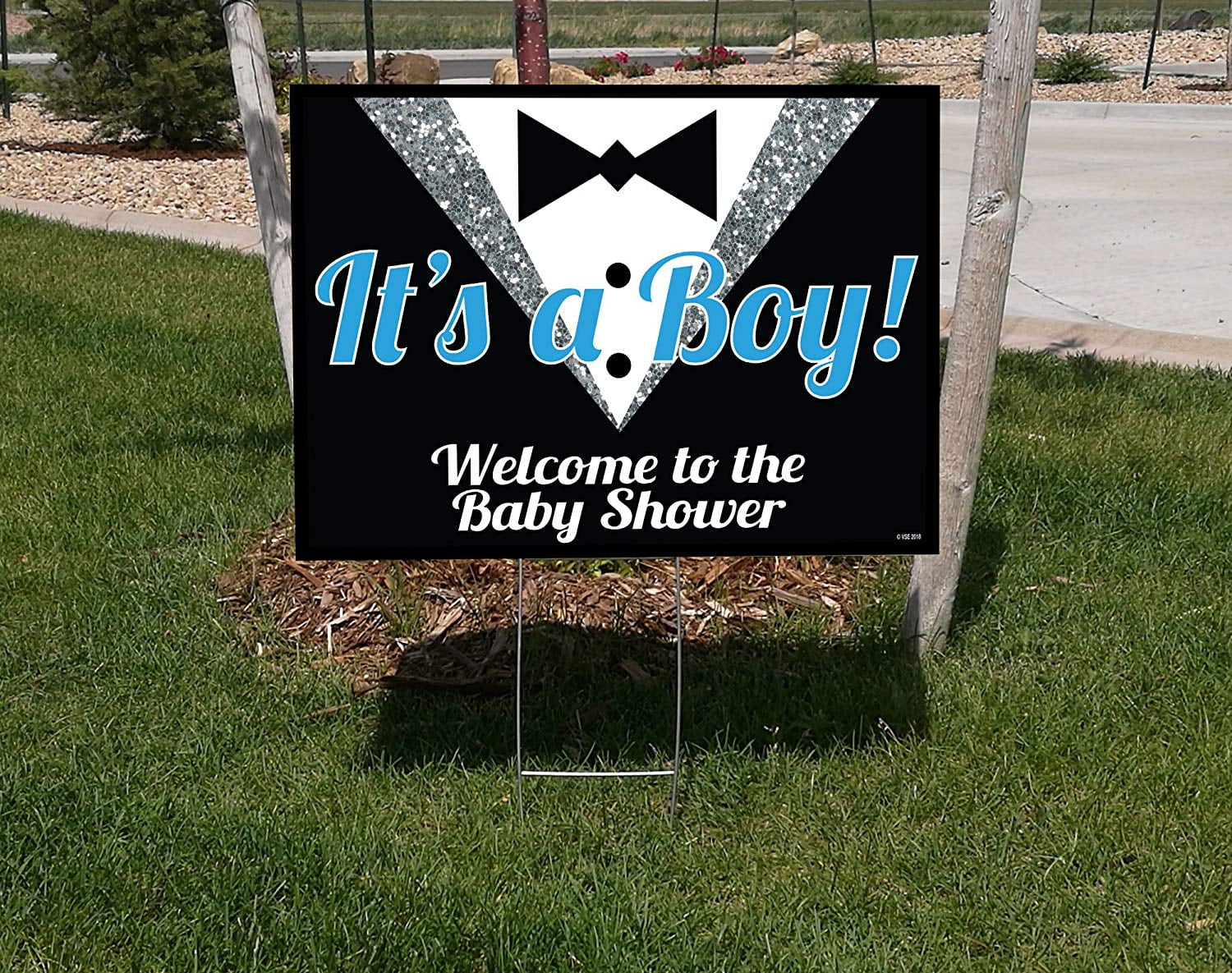 18x24 "It's A Boy" double sided Lawn Sign Baby Shower Kit with 6x24 H-stakes. Brightly colored Blue, Black, and Digitally Printed Silver Glitter on white lawn sign. Includes Directional Arrow sign